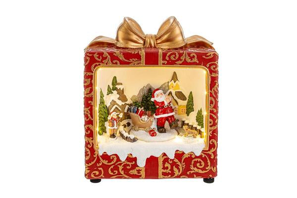 BABBO NATALE CON PAESAGGIO IN RESINA CON LED ED 8 MELODIE (19,5x12xh.24cm)
