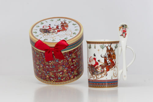 MUG CON CUCCHIAINO IN PORCELLANA DECORO CON SLITTA NATALE 300cc CON SCATOLA REGALO