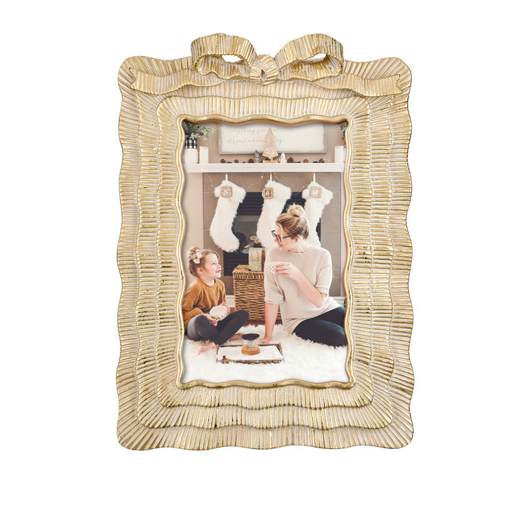 PORTAFOTO FIOCCO RETTANGOLARE PICCOLO IN PASTA DI CERAMICA ORO 16x23h (10x15cm)