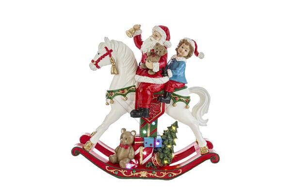 BABBO NATALE SU CAVALLUCCIO A DONDOLO IN RESINA CON LED (34x10xh.35,5cm)